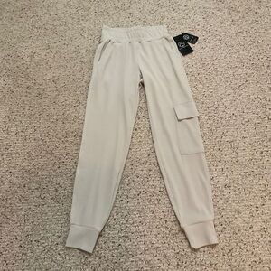 Move Theology greatest Jogger Cream Size XS